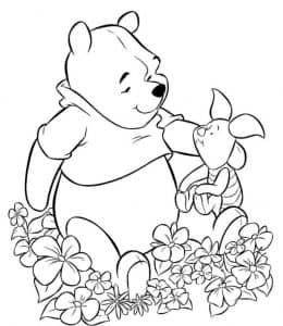 10张花丛中的《维尼小熊》和可爱小猪儿童填色图片大全